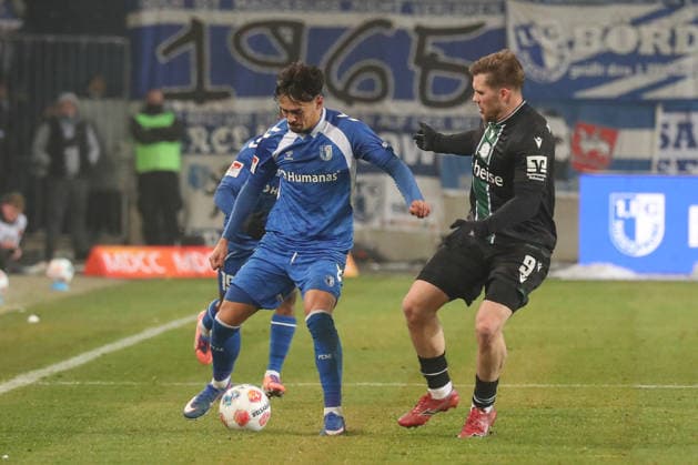 30 01 2026, xgox, Soccer 2 Bundesliga, 1 FC Magdeburg Hannover 96 emspor, v l Laurin Ulrich Magdeburg, 8 , Benjamin Källman Hannover, 9 DFL DFB REGULATIONS PROHIBIT ANY USE OF PHOTOGRAPHS as IMAGE SEQUENCES and or QUASI VIDEO Magdeburg