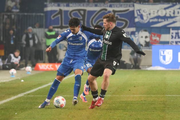 30 01 2026, xgox, Fußball 2 Bundesliga, 1 FC Magdeburg Hannover 96 emspor, v l Laurin Ulrich Magdeburg, 8 , Benjamin Källman Hannover, 9 Freisteller, Einzelbild, Ganzkoerper, single frame DFL DFB REGULATIONS PROHIBIT ANY USE OF PHOTOGRAPHS as IMAGE SEQUENCES and or QUASI VIDEO Magdeburg
