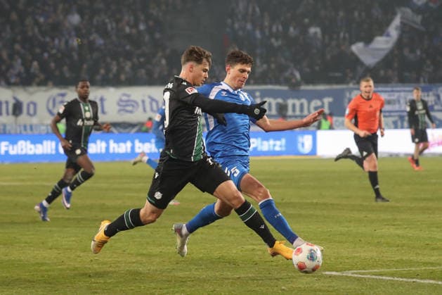 30 01 2026, xgox, Soccer 2 Bundesliga, 1 FC Magdeburg Hannover 96 emspor, v l Noah Weisshaupt Weißhaupt, Hannover, 10 Tobias Mueller Magdeburg, 5 Zweikampf, Duell, Kampf, tackle DFL DFB REGULATIONS PROHIBIT ANY USE OF PHOTOGRAPHS as IMAGE SEQUENCES and or QUASI VIDEO Magdeburg