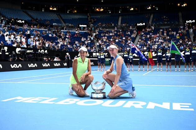TENNIS AUSTRALIAN OPEN, Elise Mertens of Belgium and Shuai Zhang of China pose with the winners trophy following their win in the women™s doubles final against Anna Danilina of Kazakhstan and Aleksandra Krunic of Serbia on day 14 of the 2026 Australian Open tennis tournament at Melbourne Park in Melbourne, Saturday, January 31, 2026. ( NO ARCHIVING MELBOURNE VICTORIA AUSTRALIA  Copyright: xJOELxCARRETTx 20260131198584782557