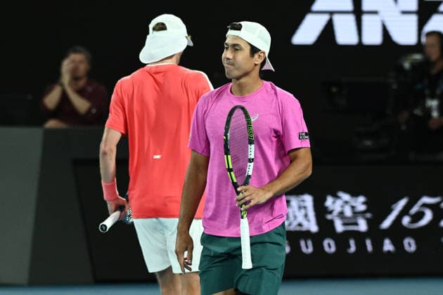 TENNIS AUSTRALIAN OPEN, Jason Kubler (pink) and Marc Polmans of Australia in action during the men™s doubles final against Christian Harrison of the USA and Neal Skupski of Great Britian on day 14 of the 2026 Australian Open tennis tournament at Melbourne Park in Melbourne, Saturday, January 31, 2026. ( NO ARCHIVING MELBOURNE VICTORIA AUSTRALIA  Copyright: xJOELxCARRETTx 20260131128788059234