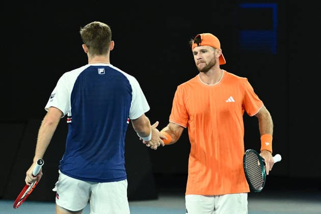 TENNIS AUSTRALIAN OPEN, Christian Harrison (orange) of the USA and Neal Skupski (blue) of Great Britian react during the men™s doubles final against Jason Kubler (pink) and Marc Polmans (red) of Australia on day 14 of the 2026 Australian Open tennis tournament at Melbourne Park in Melbourne, Saturday, January 31, 2026. ( NO ARCHIVING MELBOURNE VICTORIA AUSTRALIA  Copyright: xJOELxCARRETTx 20260131196133583838