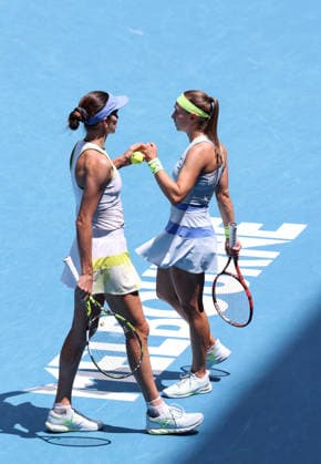 (260131) -- MELBOURNE, Jan. 31, 2026 -- Anna Danilina (L) Aleksandra Krunic celebrate scoring during the women s doubles final match between Zhang Shuai (China) Elise Mertens (Belgium) and Anna Danilina (Kazakhstan) Aleksandra Krunic (Serbia) at the Australian Open tennis tournament in Melbourne, Australia, Jan. 31, 2026. ) (SP)AUSTRALIA-MELBOURNE-TENNIS-AUSTRALIAN OPEN-WOMEN S DOUBLES-FINAL MaxPing 