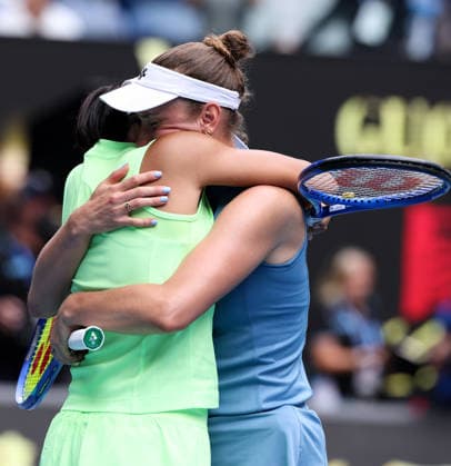 (260131) -- MELBOURNE, Jan. 31, 2026 -- Zhang Shuai (L) hugs Elise Mertens after winning the women s doubles final match between Zhang Shuai (China) Elise Mertens (Belgium) and Anna Danilina (Kazakhstan) Aleksandra Krunic (Serbia) at the Australian Open tennis tournament in Melbourne, Australia, Jan. 31, 2026. ) (SP)AUSTRALIA-MELBOURNE-TENNIS-AUSTRALIAN OPEN-WOMEN S DOUBLES-FINAL MaxPing 