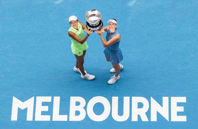 (260131) -- MELBOURNE, Jan. 31, 2026 -- Zhang Shuai (L) Elise Mertens hold the trophy during the awarding ceremony for the women s doubles final match between Zhang Shuai (China) Elise Mertens (Belgium) and Anna Danilina (Kazakhstan) Aleksandra Krunic (Serbia) at the Australian Open tennis tournament in Melbourne, Australia, Jan. 31, 2026. (Photo by Xinhua) (SP)AUSTRALIA-MELBOURNE-TENNIS-AUSTRALIAN OPEN-WOMEN S DOUBLES-FINAL HuxJingchen 