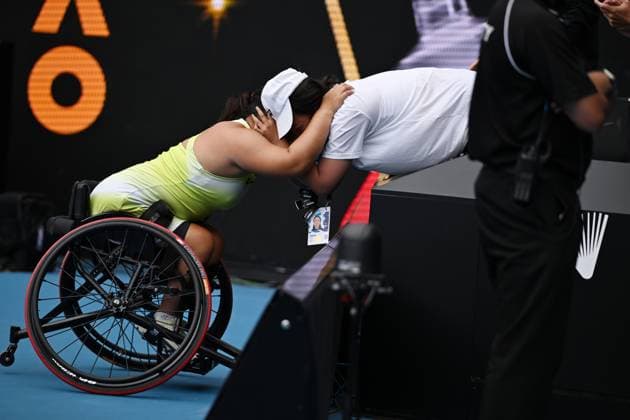 (260131) -- MELBOURNE, Jan. 31, 2026 -- Li Xiaohui (L) celebrates with her coach after winning the women s wheelchair singles final between Li Xiaohui of China and Diede De Groot of the Netherlands at the Australian Open tennis tournament in Melbourne, Australia, Jan. 31, 2026. (Photo by Xinhua) (SP)AUSTRALIA-MELBOURNE-TENNIS-AUSTRALIAN OPEN-WOMEN S WHEELCHAIR-SINGLES-FINAL WangxShen 