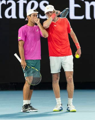 (260131) -- MELBOURNE, Jan. 31, 2026 -- Jason Kubler (L) Marc Polmans discuss during the men s doubles final match between Jason Kubler Marc Polmans (Australia) and Christian Harrison (the United States) Neal Skupski (Britain) at the Australian Open tennis tournament in Melbourne, Australia, Jan. 31, 2026. (Photo by Xinhua) (SP)AUSTRALIA-MELBOURNE-TENNIS-AUSTRALIAN OPEN-MEN S DOUBLES-FINAL HuxJingchen 