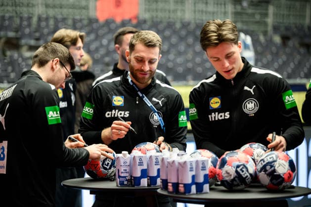 Herning Handball EM 2026 Media Day Germany Lukas Zerbe Germany , Lukas Mertens Germany , Nils Lichtlein Germany sign match balls Herning Jyske Bank Boxen Denmark