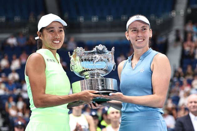 Zhang Shuai yellow , CHN, and Elise Mertens blue , BEL, after womens doubles finals at 2026 Australian Open in Melbourne, 31 01 2026