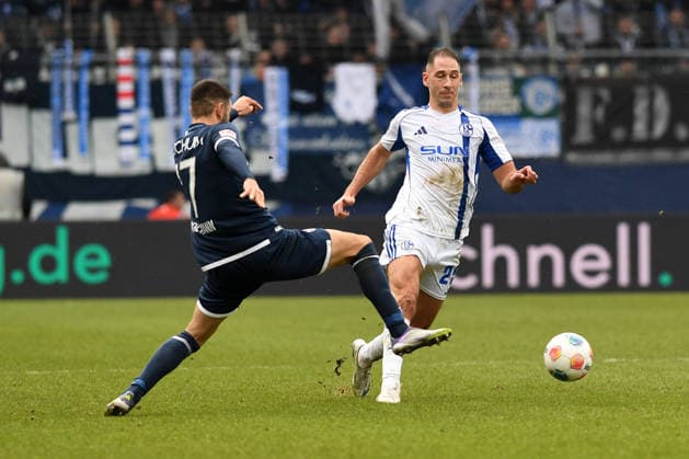 Gerrit Holtmann VfL Bochum and Nikola Katic FC Schalke 04 in a duel during the 2 Bundesliga match between VfL Bochum and FC Schalke 04, Vonovia Ruhrstadion on January 31, 2026 in Bochum, Germany Photo by Ralf Treese DeFodi Images Gerrit Holtmann VfL Bochum and Nikola Katic FC Schalke 04 battle for the ball during the 2 Bundesliga match between VfL Bochum and FC Schalke 04 at Vonovia Ruhrstadion on January 31, 2026 in Bochum, Germany Photo by Ralf Treese DeFodi Images Photo by Ralf Treese DeFodi Images