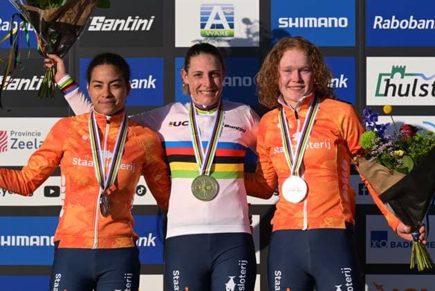 L-R, silver medalist Dutch Ceylin del Carmen Alvarado, winner world champion Dutch Lucinda Brand and bronze medalist Dutch Puck Pieterse celebrate on the podium of the elite women race at the UCI Cyclocross World Championships, on Saturday 31 January 2026, in Hulst, The Netherlands. DAVIDxPINTENS  x160056025x
