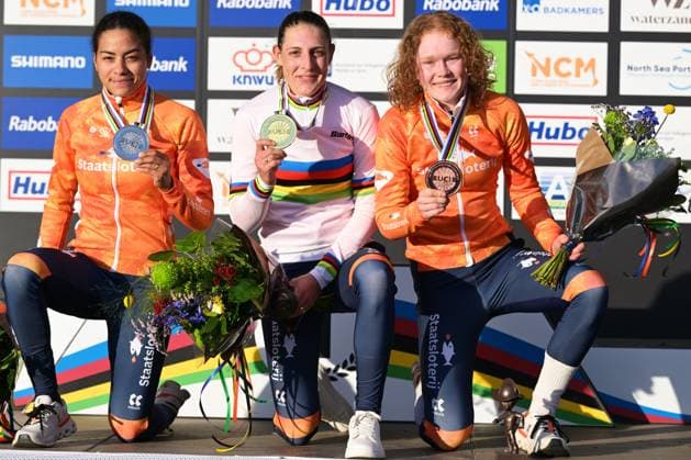 L-R, silver medalist Dutch Ceylin del Carmen Alvarado, winner world champion Dutch Lucinda Brand and bronze medalist Dutch Puck Pieterse celebrate on the podium of the elite women race at the UCI Cyclocross World Championships, on Saturday 31 January 2026, in Hulst, The Netherlands. DAVIDxPINTENS  x160056347x