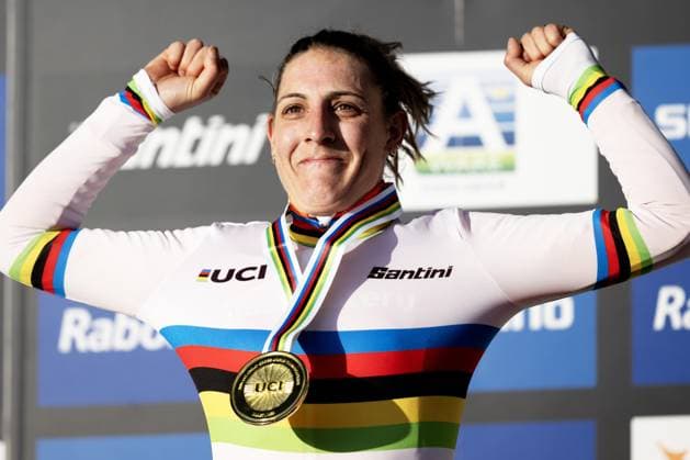 Winner Dutch Lucinda Brand celebrates wearing the world champion jersey on the podium of the elite women race at the UCI Cyclocross World Championships, on Saturday 31 January 2026, in Hulst, The Netherlands. DAVIDxPINTENS  x160056891x