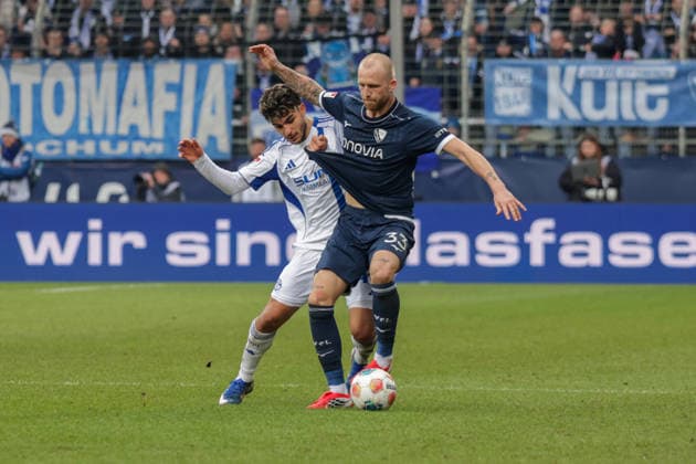 31 01 2026, xgrfx, Soccer 2 Bundesliga, VfL Bochum FC Schalke 04 v l Mertcan Ayhan FC Schalke 04 , Philipp Hofmann VfL Bochum DFL DFB REGULATIONS PROHIBIT ANY USE OF PHOTOGRAPHS as IMAGE SEQUENCES and or QUASI VIDEO Bochum