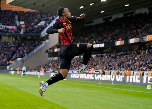 Wolverhampton, England, 31st January 2026. Eli Junior Kroupi of Bournemouth celebrates scoring the first goal during the Wolverhampton Wanderers vs AFC Bournemouth Premier League match at Molineux, Wolverhampton. Picture credit should read: Andrew Yates Sportimage EDITORIAL USE ONLY. No use with unauthorised audio, video, data, fixture lists, club league logos or live services. Online in-match use limited to 120 images, no video emulation. No use in betting, games or single club league player publications. SPI_035_AY_Wolves_Bmouth SPI-4493-0035