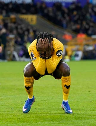 Wolverhampton, England, 31st January 2026. Tolu Arokodare of Wolverhampton Wanderers rects after missing a chance during the Wolverhampton Wanderers vs AFC Bournemouth Premier League match at Molineux, Wolverhampton. Picture credit should read: Andrew Yates Sportimage EDITORIAL USE ONLY. No use with unauthorised audio, video, data, fixture lists, club league logos or live services. Online in-match use limited to 120 images, no video emulation. No use in betting, games or single club league player publications. SPI_051_AY_Wolves_Bmouth SPI-4493-0052