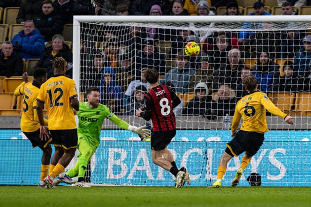 31st January 2026; Molineux Stadium, Wolverhampton, West Midlands, England; Premier League Football, Wolverhampton Wanderers versus Bournemouth; Alex Scott of AFC Bournemouth scores past Jose Sa of Wolverhampton Wanderers in the 1st minute of added time in the second half to make the score 0-2  GodfreyxPitt Content restricted for UK based newspaper