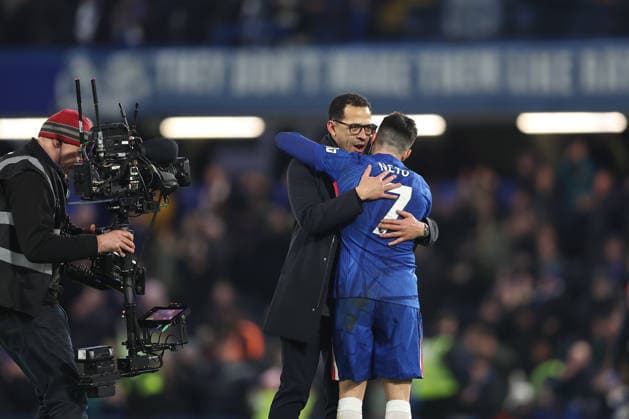 31st January 2026; Stamford Bridge, Chelsea, London, England: Premier League Football, Chelsea versus West Ham United; Pedro Neto of Chelsea embraces manager Liam Rosenior after the match  KatiexChan