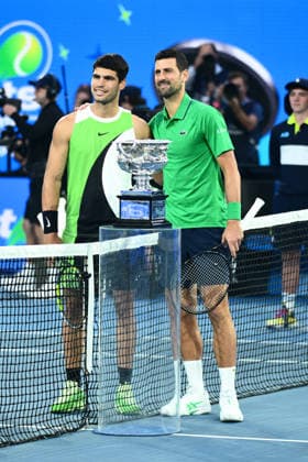 TENNIS AUSTRALIAN OPEN, Carlos Alcaraz of Spain and Novak Djokovic of Serbia pose for photographs at the net during the men™s singles final against Novak Djokovic of Serbia on day 15 of the 2026 Australian Open tennis tournament at Melbourne Park in Melbourne, Sunday, February 1, 2026. ( NO ARCHIVING MELBOURNE VICTORIA AUSTRALIA  Copyright: xJOELxCARRETTx 20260201144074315560