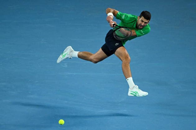 TENNIS AUSTRALIAN OPEN, Novak Djokovic of Serbia plays a shot around the net during the men™s singles final against Carlos Alcaraz of Spain on day 15 of the 2026 Australian Open tennis tournament at Melbourne Park in Melbourne, Sunday, February 1, 2026. ( NO ARCHIVING MELBOURNE VICTORIA AUSTRALIA  Copyright: xJAMESxROSSx 20260201147576776000