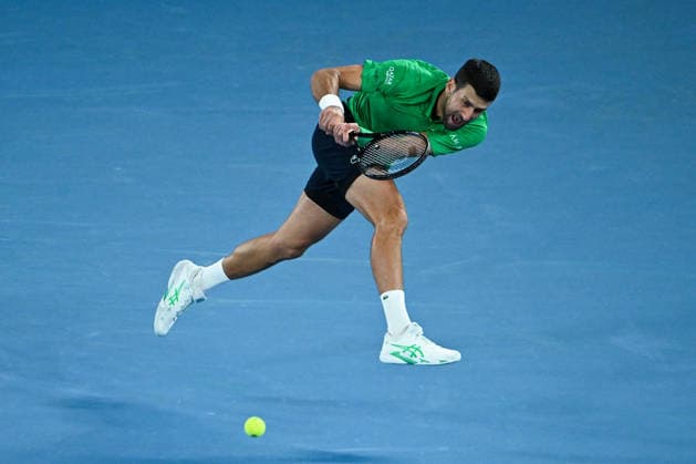 TENNIS AUSTRALIAN OPEN, Novak Djokovic of Serbia plays a shot around the net during the men™s singles final against Carlos Alcaraz of Spain on day 15 of the 2026 Australian Open tennis tournament at Melbourne Park in Melbourne, Sunday, February 1, 2026. ( NO ARCHIVING MELBOURNE VICTORIA AUSTRALIA  Copyright: xJAMESxROSSx 20260201185406416645