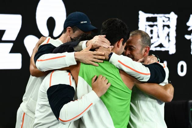 TENNIS AUSTRALIAN OPEN, Carlos Alcaraz of Spain celebrates with his team after winning the men™s singles final against Novak Djokovic of Serbia on day 15 of the 2026 Australian Open tennis tournament at Melbourne Park in Melbourne, Sunday, February 1, 2026. ( NO ARCHIVING MELBOURNE VICTORIA AUSTRALIA  Copyright: xJOELxCARRETTx 20260201189423562474