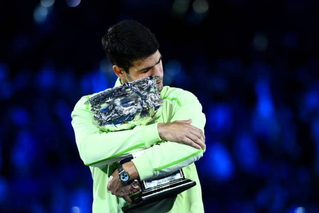 TENNIS AUSTRALIAN OPEN, Carlos Alcaraz of Spain holds the trophy after winning the men™s singles final against Novak Djokovic of Serbia on day 15 of the 2026 Australian Open tennis tournament at Melbourne Park in Melbourne, Sunday, February 1, 2026. ( NO ARCHIVING MELBOURNE VICTORIA AUSTRALIA  Copyright: xJOELxCARRETTx 20260201130392137759
