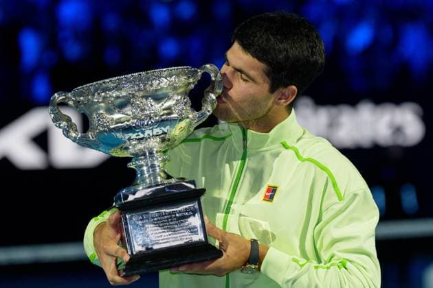 February 1, 2026: 1st seed CARLOS ALCARAZ of Spain with the The Norman Brookes Challenge Cup after defeating 4th seed NOVAK DJOKOVIC of Serbia on Rod Laver Arena in the Men s Singles Final match on day 15 of the 2026 Australian Open in Melbourne, Australia. Cal Media Melbourne Australia - ZUMAc04_ 20260201_faf_c04_030 Copyright: xSydneyxLowx