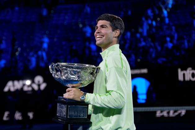 February 1, 2026: 1st seed CARLOS ALCARAZ of Spain with the The Norman Brookes Challenge Cup after defeating 4th seed NOVAK DJOKOVIC of Serbia on Rod Laver Arena in the Men s Singles Final match on day 15 of the 2026 Australian Open in Melbourne, Australia. Cal Media Melbourne Australia - ZUMAc04_ 20260201_faf_c04_033 Copyright: xSydneyxLowx