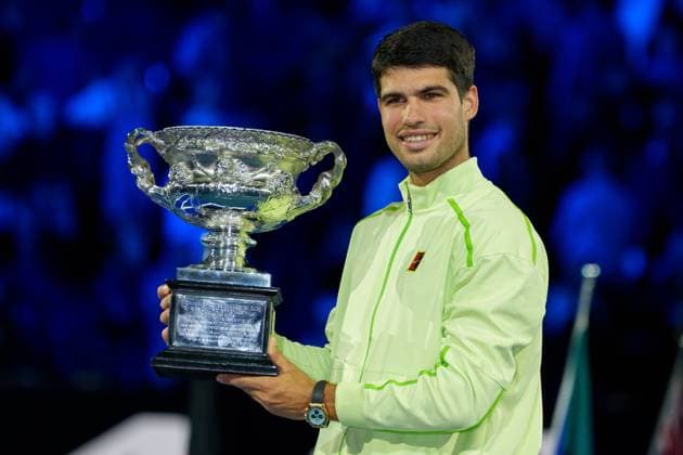 February 1, 2026: 1st seed CARLOS ALCARAZ of Spain with the The Norman Brookes Challenge Cup after defeating 4th seed NOVAK DJOKOVIC of Serbia on Rod Laver Arena in the Men s Singles Final match on day 15 of the 2026 Australian Open in Melbourne, Australia. Cal Media Melbourne Australia - ZUMAc04_ 20260201_faf_c04_035 Copyright: xSydneyxLowx