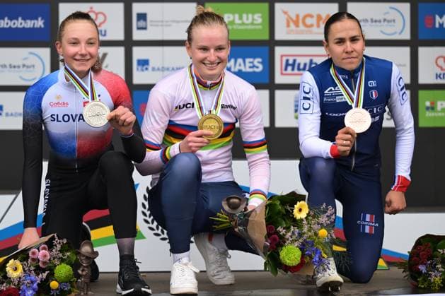 L-R, silver medalist Slovak Viktoria Chladonova, winner Dutch Leonie Bentveld wearing the world champion jersey and bronze medalist French Celia Gery celebrate on the podium of the U23 women race at UCI Cyclocross World Championships, on Sunday 01 February 2026, in Hulst, The Netherlands. DAVIDxPINTENS  x160238924x