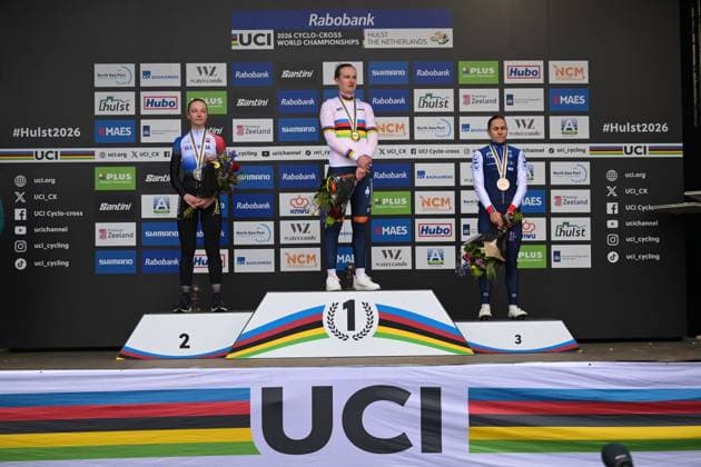 L-R, silver medalist Slovak Viktoria Chladonova, winner Dutch Leonie Bentveld wearing the world champion jersey and bronze medalist French Celia Gery celebrate on the podium of the U23 women race at UCI Cyclocross World Championships, on Sunday 01 February 2026, in Hulst, The Netherlands. DAVIDxPINTENS  x160238952x