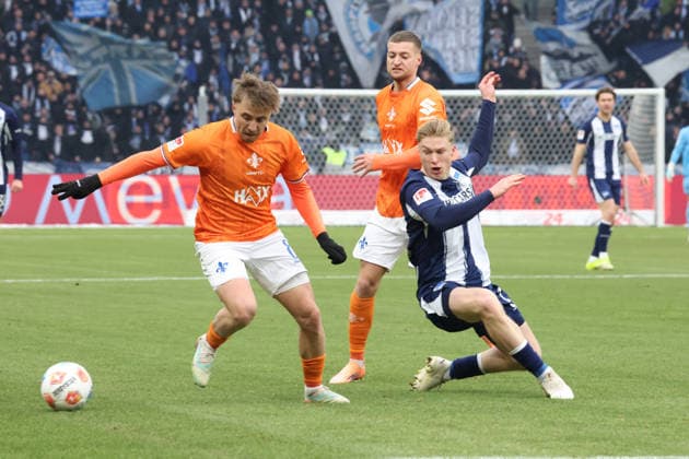 DEU, DFL, 2 FBL, Hertha BSC vs Darmstadt, 01 02 2026, Berliner Olympiastadion, Berlin, DEU, DFL, 2 FBL, Hertha BSC vs Darmstadt, im Bild Julian Eitschberger Hertha BSC Berlin 2 , Fabian Nuernberger Darmstadt 15 , Luca Marseiler Darmstadt 8 DFL regulations prohibit any use of Photographs as image sequences and or quasi video nordphotoxGmbHx xEngler nph00076
