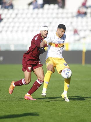 Walid Khedira of US Lecce and Saul Coco of Torino FC fighting for the ball during the Italian Serie A 2025 26 season football match between Torino FC and US Lecce on 01 February 2026 at Stadio Olimpico Grende Torino ,Turin, Italy. Photo Nderim KACELI  Copyright: xNderimxKaceli IPAxSportx xipa-agency.netx xx IPA_70838211 IPA_Agency_IPA70838211