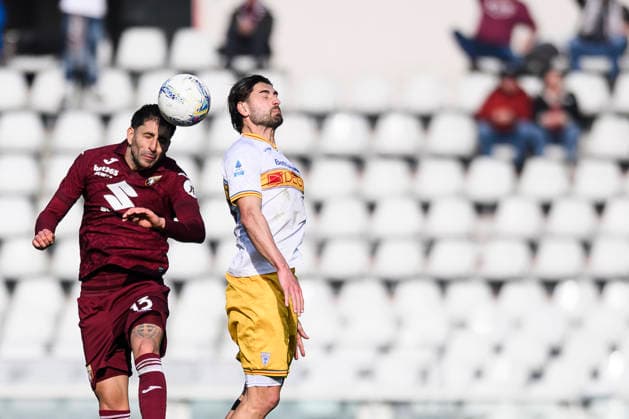 Torino FC v US Lecce - Serie A Guillermo Maripan of Torino FC competes for a header with Santiago Pierotti of US Lecce during the Serie A football match between Torino FC and US Lecce. Turin Italy Copyright: xNicolòxCampox