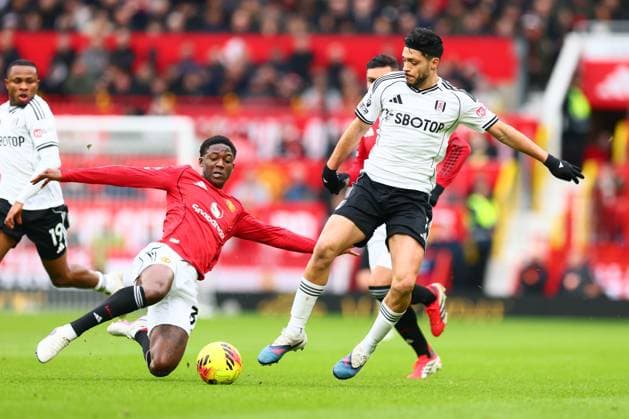 Kobbie Mainoo of Manchester United, ManU and Raul Jimenez of Fulham Manchester United v Fulham, Premier League, Football, Old Trafford, Manchester, UK - 01 Feb 2026Manchester Old Trafford United Kingdom EDITORIAL USE ONLY No use with unauthorised audio, video, data, fixture lists, club league logos or live services. Online in-match use limited to 120 images, no video emulation. No use in betting, games or single club league player publications. Copyright: xPaulxCurrie Shutterstockx 16496861dd