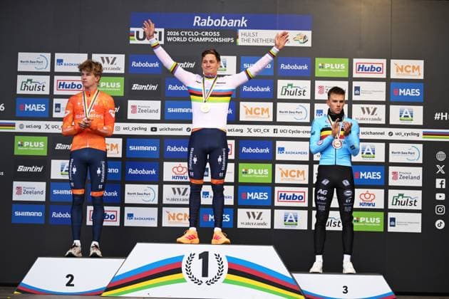Dutch Tibor Del Grosso, Dutch Mathieu van der Poel and Belgian Thibau Nys celebrate on the podium after the men elite race at UCI Cyclocross World Championships, on Sunday 01 February 2026, in Hulst, The Netherlands. DAVIDxPINTENS  x160260243x