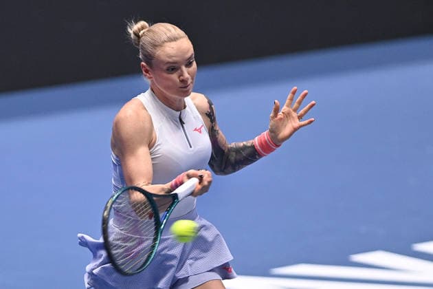 Tereza Martincova of Czech Republic returns a ball to Dalma Galfi of Hungary during the WTA, Tennis Damen women s tennis tournament Ostrava Open match on February 1, 2026, in Ostrava, Czech Republic. (CTKxPhoto JaroslavxOzana) CTKPhotoP2026020104985  CTKPhotoP2026020104985