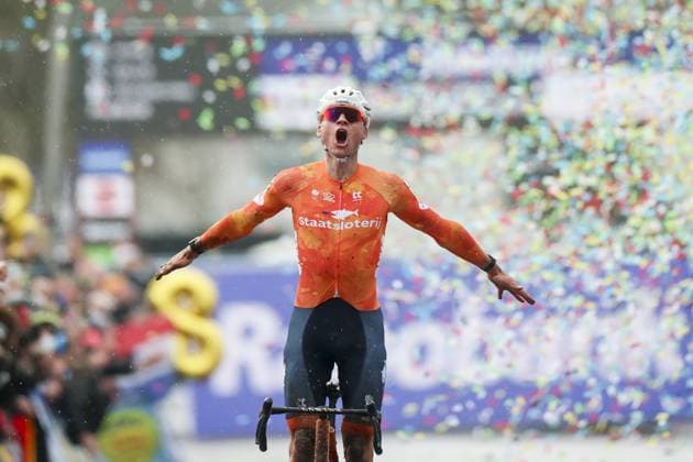 HULST - Cyclist Mathieu van der Poel celebrates his victory at the Cyclocross World Championships in Hulst, Zeeland. IRIS VAN DEN BROEK ANP xVIxANPxSportx xxANPxIVx 549344752 originalFilename: 549344752.jpg