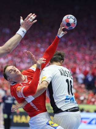 Denmark v Germany - Men s EHF EURO 2026 Final Mathias Gidsel of Denmark in action against Julian Koster of Germany during the Men s EHF EURO 2026 Final match between Denmark and Germany at Jyske Bank Boxen on February 1, 2026 in Herning, Denmark.  SanjinxStrukic PIXSELL