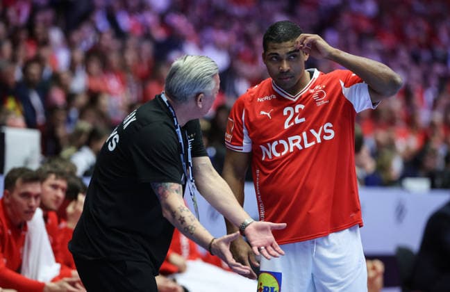 Denmark v Germany - Men s EHF EURO 2026 Final Head Coach of Denmark Nikolaj Jacobsen speaks with Mads Mensah of Denmark during the Men s EHF EURO 2026 Final match between Denmark and Germany at Jyske Bank Boxen on February 1, 2026 in Herning, Denmark.  SanjinxStrukic PIXSELL