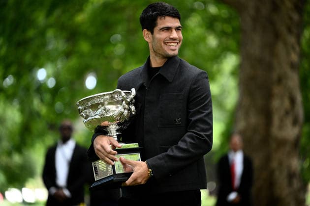 TENNIS AUSTRALIAN OPEN, Carlos Alcaraz of Spain poses for a photograph with the Norman Brookes Challenge Cup after winning the Australian Open 2026 men™s singles final against Novak Djokovic of Serbia at the Royal Exhibition Building in Melbourne, Monday, February 2, 2026. ( NO ARCHIVING MELBOURNE VICTORIA AUSTRALIA  Copyright: xJOELxCARRETTx 20260202131891932480