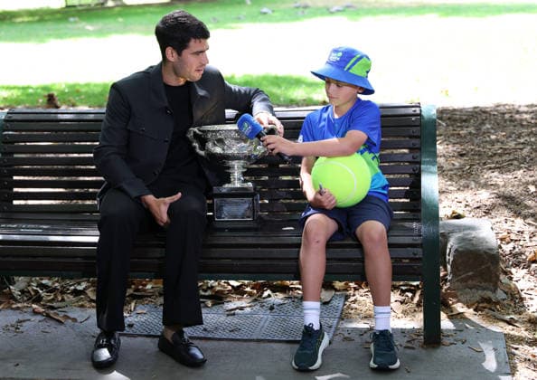 February 2, 2026, Melbourne, Victoria, Australia: CARLOS ALCARAZ of Spain and BEN VALDES-ROSAS (8 years old) during interview after the final of Australian Open, Melbourne, Australia. Melbourne Australia - ZUMAc278 20260202_zsp_c278_022 Copyright: xMarcinxCholewinskix