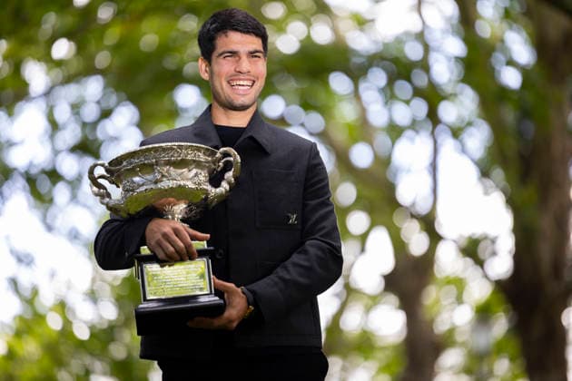 (260202) -- MELBOURNE, Feb. 2, 2026 -- Carlos Alcaraz of Spain poses with the Norman Brookes Challenge Cup during the 2026 Australian Open men s champion media opportunity at the Royal Exhibition Building in Melbourne, Australia, Feb. 2, 2026. (Photo by Xinhua) (SP)AUSTRALIA-MELBOURNE-TENNIS-AUSTRALIAN OPEN-TROPHY-ALCARAZ HuxJingchen 