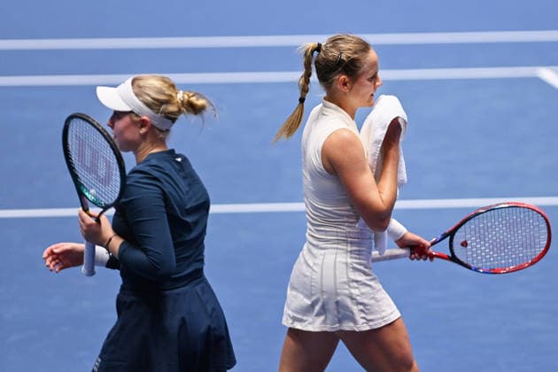 Brenda Fruhvirtova from Czechia, left, and Fiona Ferro from France, right, are seen during a match within the WTA, Tennis Damen women s tennis tournament Ostrava Open, on February 2, 2026, in Ostrava, Czech Republic. (CTKxPhoto JaroslavxOzana) CTKPhotoP2026020206566  CTKPhotoP2026020206566