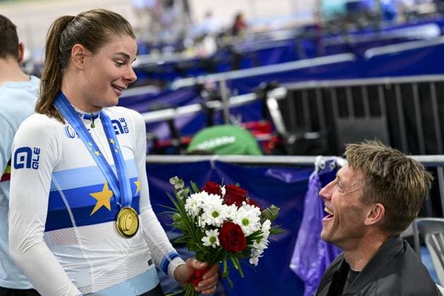 Belgian Lotte Kopecky receives flowers from former Belgian cyclist Axel Merckx after she won a gold medal at the second day of the 2026 UEC Track Elite European Championships, in Konya, Turkey, Monday 02 February 2026. The European Championships take place from 01 to 05 February 2026. DIRKxWAEM  x160529387x