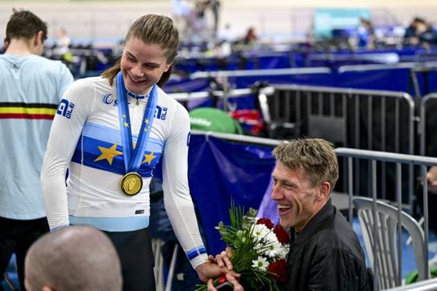 Belgian Lotte Kopecky receives flowers from former Belgian cyclist Axel Merckx after she won a gold medal at the second day of the 2026 UEC Track Elite European Championships, in Konya, Turkey, Monday 02 February 2026. The European Championships take place from 01 to 05 February 2026. DIRKxWAEM  x160529439x