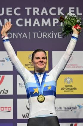 Winner Belgian Lotte Kopecky celebrates on the podium wearing the European champion jersey and her gold medal at the women s Elimination Race on the second day of the 2026 UEC Track Elite European Championships, in Konya, Turkey, Monday 02 February 2026. The European Championships take place from 01 to 05 February 2026. DIRKxWAEM  x160531981x