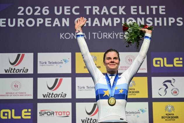 Winner Belgian Lotte Kopecky celebrates on the podium wearing the European champion jersey and her gold medal at the women s Elimination Race on the second day of the 2026 UEC Track Elite European Championships, in Konya, Turkey, Monday 02 February 2026. The European Championships take place from 01 to 05 February 2026. DIRKxWAEM  x160531992x