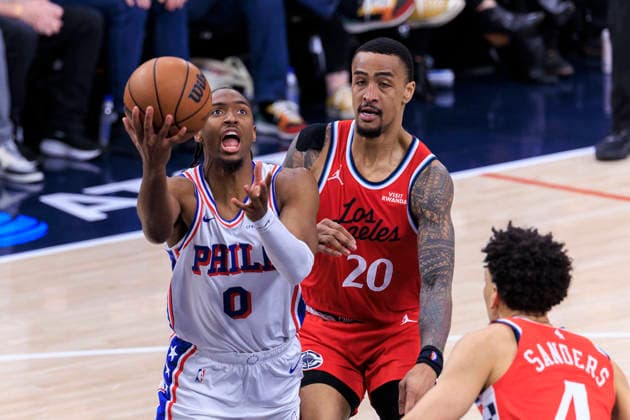 February 2, 2026, Inglewood, California, USA: Tyrese Maxey 0 of the Philadelphia 76ers makes a layup as Kobe Sanders 4 and John Collins 20 of the Los Angeles Clippers defend during their regular season NBA, Basketball Herren, USA game on Monday February 2, 2026 at Intuit Dome in Inglewood, California. Clippers lose to 76ers, 113-128. ARIANA RUIZ PI Inglewood USA - ZUMAp124 20260202_zaa_p124_010 Copyright: xArianaxRuizx